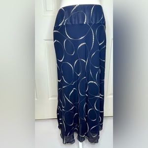 East 5th Navy Blue with white dots.  Sheer, A-line Long skirt. Size 12